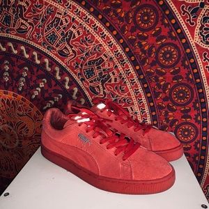 All red suede puma sneakers